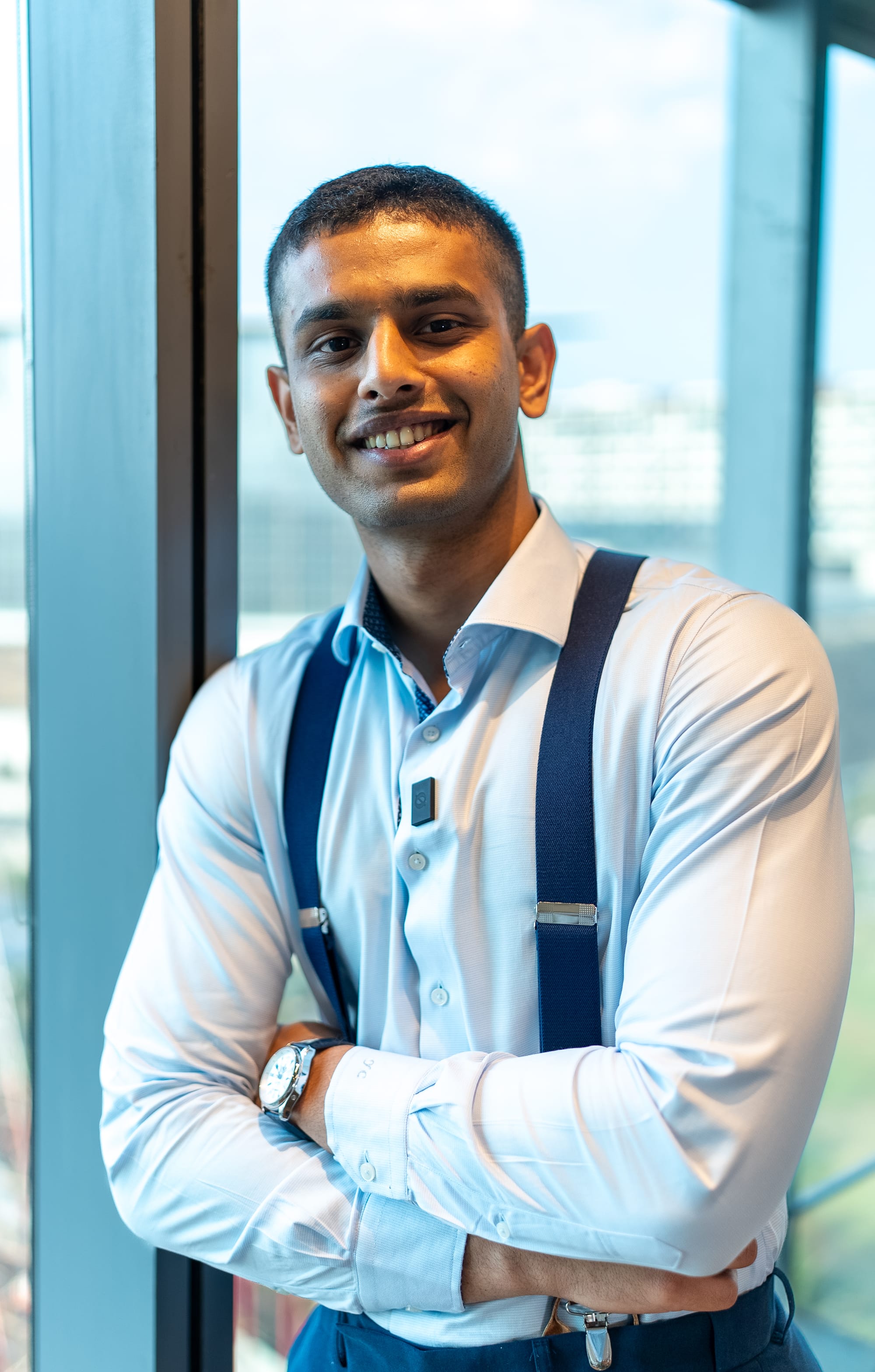 Image of Yash Chavan in stylish suspenders and a blue shirt